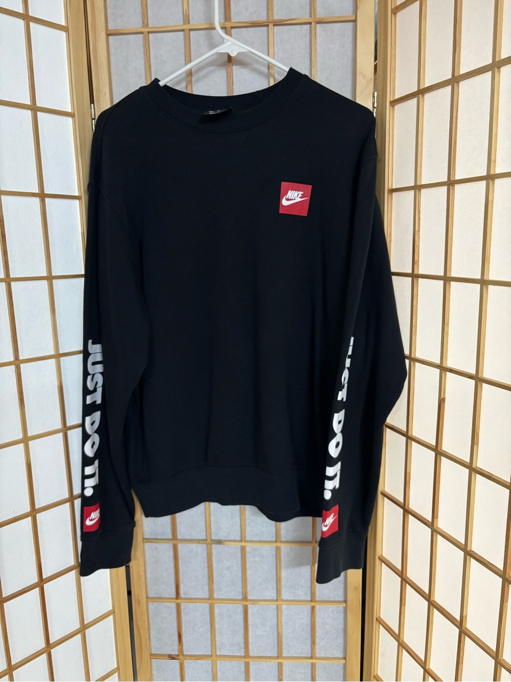 Nike Men’s Black Crewneck Sweatshirt with Red Logo Accents